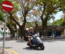 Scooterist at Largo do Presidente Antonio Ramhalo Eanes