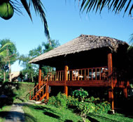 Coco Beach Resort Vietnam wooden cabin on stilts