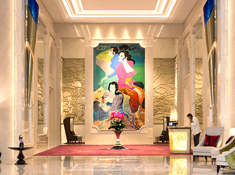Raffles marble lobby with mural, one of the best Jakarta conference hotels