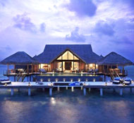 Perched above emerald waters, stilted villas offer grand vistas