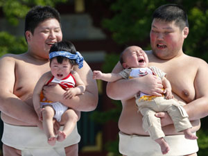 Managing small kids is tough, even for Sumo wrestlers