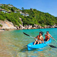 Kids kayaking at Banyan Tree Samui