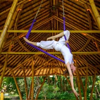 Anti-gravity yoga at Four Seasons Sayan - Dharma Shanti Yoga Bale