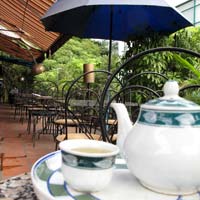 Hanoi fun guide, hideaway Zigzag cafe balcony on Trang Tien Street corner
