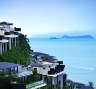 Cliff-face Conrad Samui villas beckon