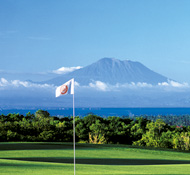 Swing out on the green with Mt Agung as the backdrop
