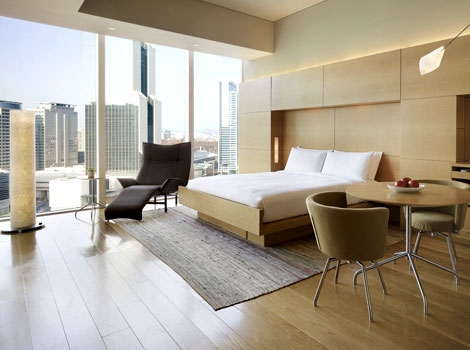Cool blonde-wood and minimalist grey help position this as one of the best Seoul luxury hotels