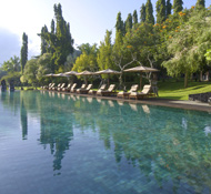 Soak in the rays at the large sun-dappled pool