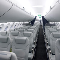 A220 vs B737 MAX - Air Baltic's A220-300 interior with wider seats in a 3-2 configuration