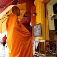 Phnom penh guide, monks seek alms