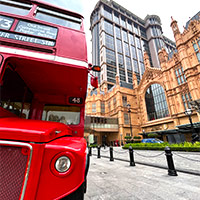 Macau gaming review vs Singapore Resorts World: Londoner Macao sports a red London bus outside
