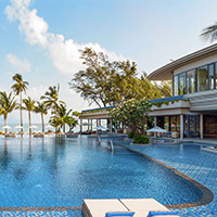 Stylish Melia Koh Samui has a huge snaking pool with slides and quiet spaces for parents