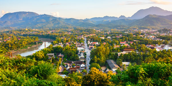 Early morning Luang Prabang panorama, rolling hills, temples, rivers and sleepy lanes
