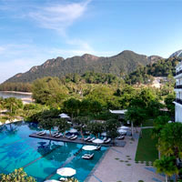 Danna overlooks a nice pool and a stretch of beach