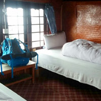 Pokhara area guest houses are clean but simple with chicken curry and rice meals