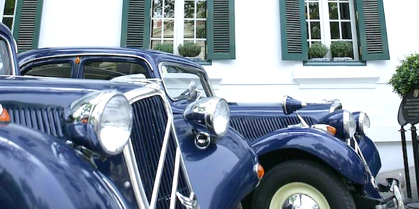 Sofitel Legend Metropole Hanoi with its signature blue Citroens