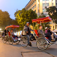 Pedicab tour nears the historic Opera House