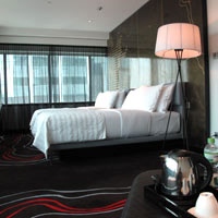 Le Meridien rooms are dark toned and mod
