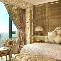 Saigon luxury hotels and suites, The Reverie Suite in gold hues